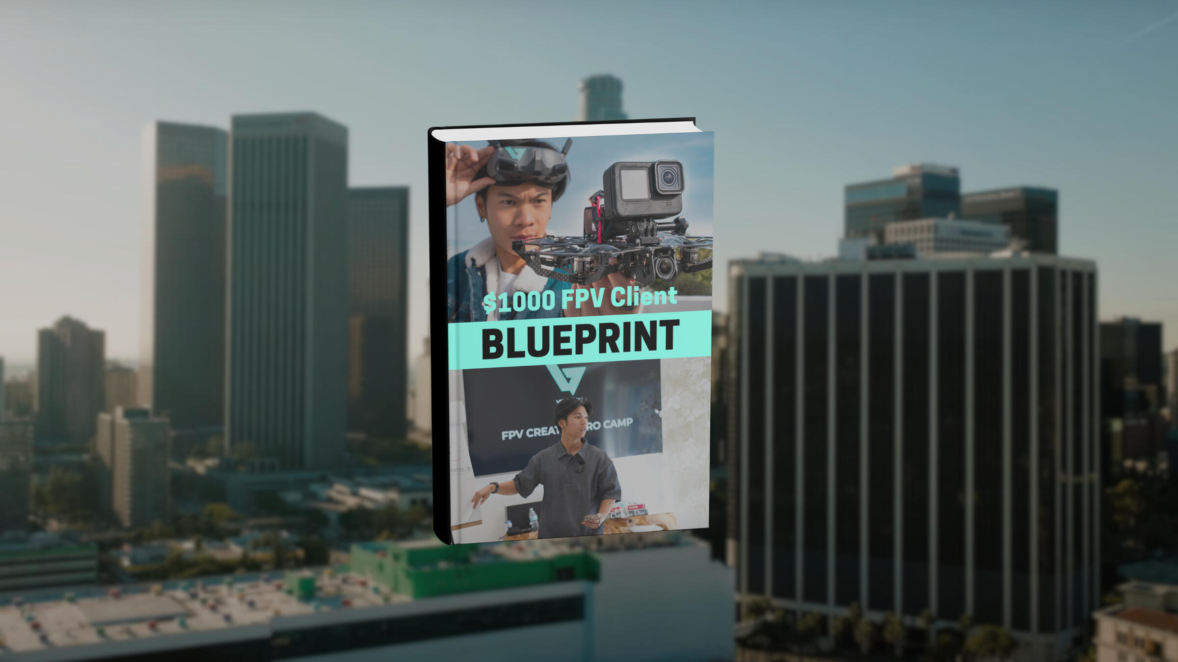 $1K FPV Client Email Preview LA cityscape in the background, with phone in foreground with screen showing preview of first email from the program